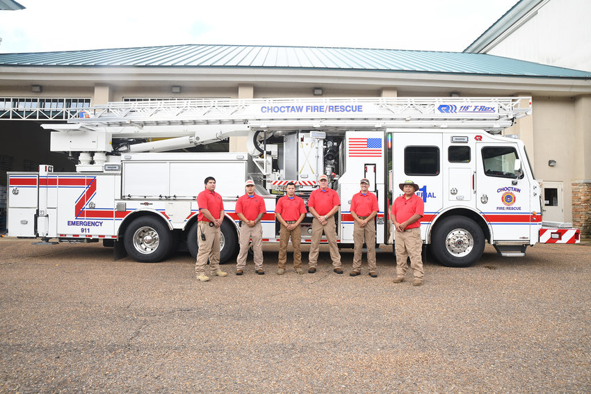 In front of the Tribe’s new T-Rex ladder truck, one of the largest in the state, are firefighter Brett Shoemake, firefighter Dalen Wheeler, Sgt.  Marco Patrick, firefighter/medic Barry Harrison, Sgt. Derek Partridge, and Sgt. Billy Wallace.